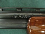 6900 Winchester 101 field 410 gauge 28 inch barrels,skeet/skeet, 2 1/2 inch chambers, pistol grip with cap, opens/closes/tite, bores/brite/shiny. SILV - 14 of 18