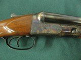 6923 Parker VH DELUXE 12 gauge 26 barrels, ic/mod, double trigger swooping deluxe forend, all numbers match,case colored receiver, restored to new, CH - 7 of 17