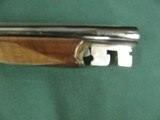 6913 Dickinson 202 410 gauge 28 inch barrels f/f, scalloped receiver, case colored receiver, ejectors, double triggers, splinter, checkered butt, 5 lb - 14 of 14