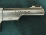 6954 Ruger S P 101 22 long rifle, 4 inch barrel, stainless steel, walnut and rubber grips, adjustable rear site, fiber optic front site, not a mark on - 10 of 10