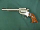 6953 Ruger Single 9 22 mag, NEW IN BOX, 6 inch barrel, 9 shot engraved cylinder, wood composite grip, stainless steel,
adjustable rear site, fiber op - 4 of 11
