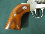 6953 Ruger Single 9 22 mag, NEW IN BOX, 6 inch barrel, 9 shot engraved cylinder, wood composite grip, stainless steel,
adjustable rear site, fiber op - 7 of 11