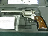 6953 Ruger Single 9 22 mag, NEW IN BOX, 6 inch barrel, 9 shot engraved cylinder, wood composite grip, stainless steel,
adjustable rear site, fiber op - 2 of 11
