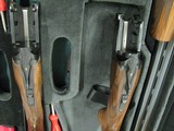 6964 Perazzi MX 2000 CUSTOM MATCHED PAIR gun#1 12ga 31 1/2 bls xf/f,gun #2 mod/full 31 1/2 bls, #1 is new unfired,#2 shot 200rds.both guns are identic - 3 of 12