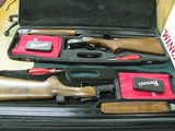 6964 Perazzi MX 2000 CUSTOM MATCHED PAIR gun#1 12ga 31 1/2 bls xf/f,gun #2 mod/full 31 1/2 bls, #1 is new unfired,#2 shot 200rds.both guns are identic - 2 of 12