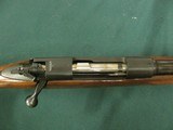 6968 Winchester Model 70 FEATHERWEIGHT 243 cal. 22 inch barrel, Hooded front site, sling swivels, butt plate, mfg 1959 97-98% condition.all original a - 12 of 12