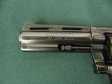6972 Colt Diamondback 22 long rifle, 4 inch barrel, never turned, wood grips, not a mark on it. box s/n matches revolver s/n.we also
have the 6 inch - 9 of 10