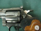 6972 Colt Diamondback 22 long rifle, 4 inch barrel, never turned, wood grips, not a mark on it. box s/n matches revolver s/n.we also
have the 6 inch - 7 of 10