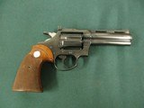 6972 Colt Diamondback 22 long rifle, 4 inch barrel, never turned, wood grips, not a mark on it. box s/n matches revolver s/n.we also
have the 6 inch - 4 of 10