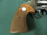 6972 Colt Diamondback 22 long rifle, 4 inch barrel, never turned, wood grips, not a mark on it. box s/n matches revolver s/n.we also
have the 6 inch - 6 of 10