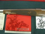 6978 Winchester model 70 Classic Featherweight 7mm REM MAG cal 24 inch barrel,claw feed,mfg in Connecticut.NEW IN BOX,BOLT NEVER PUT IN.
walnut stain - 5 of 11