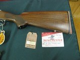 6978 Winchester model 70 Classic Featherweight 7mm REM MAG cal 24 inch barrel,claw feed,mfg in Connecticut.NEW IN BOX,BOLT NEVER PUT IN.
walnut stain - 3 of 11