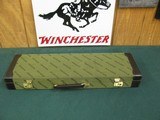 6999
Winchester QUAIL SPECIAL 101 410 gauge 26 inch barrels,mod/full,bird dog/quail engraved coin silver receiver,Winchester pad, all original.AS NEW - 1 of 15