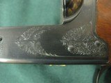 7016 Winchester 23 Classic 20 gauge 26 inch barrels ic/mod, vent rib, pistol grip with cap, ejectors, single select trigger, GOLD raised relief pheasa - 9 of 18