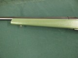 7043 Weatherby Mark V 7mm Weatherby Magnum 26 inch barrel, muzzle brake,drilled and taped for scope, sling swivels, green Weatherby stock. likes Barne - 4 of 12