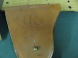 7052 WW II web belt:R.M.C.O. 1943 in excellent+condition.Holster:Sears 1942 for 1911A1pistol ex+condition.1911A1.Mag pouch:Hoff mfg co 1942 unused,Two - 4 of 9