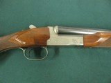 7066 Winchester 23 Pigeon XTR 20 gauge 28 inch barrels mod/full, beavertail, vent rib round knob ejectors, coins silver rose and scroll engraved recei - 12 of 15