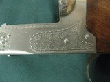 7068 Winchester 23 Pigeon XTR 20ga 28bls
mod/full, vent rib,ejectors, coin silver rose and scroll engraved coin silver receiver, 2 3/4&3inch chambers - 4 of 13