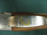 7088 Fausti Field 12 gauge 28 inch barrels 5 chokes wrench, papers, correct case, trigger bow has a "C" in gold on it.rubber butt pad tapere - 11 of 13