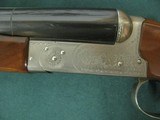 7093 Winchester 23 Pigeon XTR 12 gauge 26 inch barrels,4 screw chokes ic mod full xfull,vent rib, ejectors, round knob, all original, Winchester pad - 13 of 13