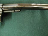 7099 Smith Wesson 17-3 22 long rifle 8 3/8 barrel full target, double action, Patridge front site,MCS rear,checkered Magna grips, medallions blue, MFG - 12 of 13