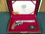 7107 Smith Wesson
629-3 44 MAGNUM 7 1/2 barrel , Cherry wood presentation case,stainless steel, red ramp front site,Goncolo medalion grips,Highly Pol - 1 of 14