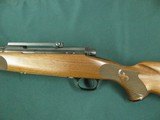 7130 Winchester model 70 257 Roberts 22 inch barrel Winchester pad, Leupold one piece base, schnabel forend, pistol grip with cap, 99% condition. as n - 3 of 13