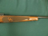 7130 Winchester model 70 257 Roberts 22 inch barrel Winchester pad, Leupold one piece base, schnabel forend, pistol grip with cap, 99% condition. as n - 8 of 13