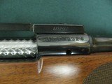 7130 Winchester model 70 257 Roberts 22 inch barrel Winchester pad, Leupold one piece base, schnabel forend, pistol grip with cap, 99% condition. as n - 10 of 13
