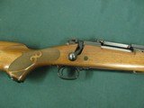 7130 Winchester model 70 257 Roberts 22 inch barrel Winchester pad, Leupold one piece base, schnabel forend, pistol grip with cap, 99% condition. as n - 7 of 13