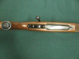 7130 Winchester model 70 257 Roberts 22 inch barrel Winchester pad, Leupold one piece base, schnabel forend, pistol grip with cap, 99% condition. as n - 13 of 13