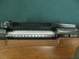 7130 Winchester model 70 257 Roberts 22 inch barrel Winchester pad, Leupold one piece base, schnabel forend, pistol grip with cap, 99% condition. as n - 9 of 13