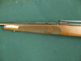 7130 Winchester model 70 257 Roberts 22 inch barrel Winchester pad, Leupold one piece base, schnabel forend, pistol grip with cap, 99% condition. as n - 4 of 13