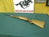 7130 Winchester model 70 257 Roberts 22 inch barrel Winchester pad, Leupold one piece base, schnabel forend, pistol grip with cap, 99% condition. as n - 1 of 13