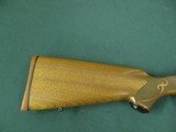 7130 Winchester model 70 257 Roberts 22 inch barrel Winchester pad, Leupold one piece base, schnabel forend, pistol grip with cap, 99% condition. as n - 6 of 13