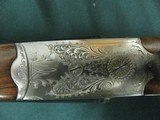 7153 Merkel model 260E 12ga 28bl ic mod Straight grip 1 1/2 x 2 1/2 x14 1/4 5lbs 12 oz scalloped receiver engraved by Herbert Wohlmuth cocking indicat - 9 of 18