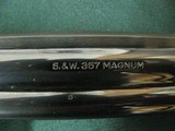 7157 Smith Wesson 586 357 MAGNUM 1982 mfg. serialized, to the the box, papers Walnut grips 6 inch barrel adjustable rear site, excellent condition. ex - 13 of 13