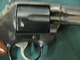 7157 Smith Wesson 586 357 MAGNUM 1982 mfg. serialized, to the the box, papers Walnut grips 6 inch barrel adjustable rear site, excellent condition. ex - 11 of 13