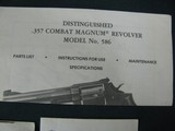 7157 Smith Wesson 586 357 MAGNUM 1982 mfg. serialized, to the the box, papers Walnut grips 6 inch barrel adjustable rear site, excellent condition. ex - 2 of 13