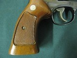 7157 Smith Wesson 586 357 MAGNUM 1982 mfg. serialized, to the the box, papers Walnut grips 6 inch barrel adjustable rear site, excellent condition. ex - 10 of 13