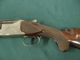 7169 Winchester 101 Pigeon 12 gauge 28 inch barrels mod and full fixed choked, early one with very dark walnut and diamond tipped tool engraving. orig - 3 of 14