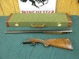7175 Winchester HEAVY DUCK 12 GAUGE 30 INCH BARELS
full/full, NEW IN WINCHESTER CASE, AA++heavily figured walnut.single select trigger, ejectors, pis - 3 of 15