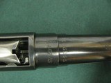 7215 Winchester model 12 20 gauge 28 inch barrel mod choke,plain barrel, White line pad 12.5 lop, 98-99% condition, bore brite shiny, opens closes pos - 12 of 14