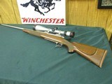 7227 Winchester model 70 300 Win Mag stainless steel, Zeiss 6.5x 20x50 Conquest target turrets,muzzle brake,regular recticle, cheek piece 99% conditio - 1 of 12