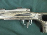 7228 Winchester model 70 Coyote 308 caliber Grey Laminate wood, thumbhole, Winchester pad, 99% condition,medium stainless steel barrel, scope bases.I - 3 of 13