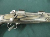7228 Winchester model 70 Coyote 308 caliber Grey Laminate wood, thumbhole, Winchester pad, 99% condition,medium stainless steel barrel, scope bases.I - 8 of 13