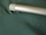 7228 Winchester model 70 Coyote 308 caliber Grey Laminate wood, thumbhole, Winchester pad, 99% condition,medium stainless steel barrel, scope bases.I - 6 of 13
