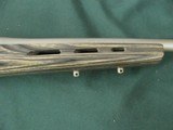 7228 Winchester model 70 Coyote 308 caliber Grey Laminate wood, thumbhole, Winchester pad, 99% condition,medium stainless steel barrel, scope bases.I - 9 of 13