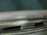 7228 Winchester model 70 Coyote 308 caliber Grey Laminate wood, thumbhole, Winchester pad, 99% condition,medium stainless steel barrel, scope bases.I - 10 of 13
