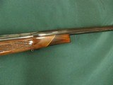 7256 Winslow COMMANDER MODEL ON BUSHMASTER STOCK Custom rifle mfg in Florida Circa 1975, Belgium Mauser 98 action, only approx 500 mfg,7 mm REM MAG, 2 - 14 of 15